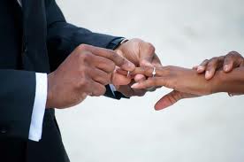 wedding rings on fingers